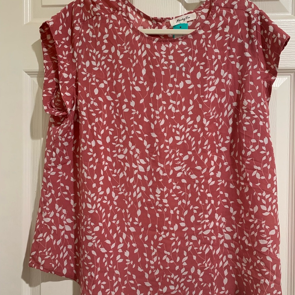 Sleeveless women’s blouse.